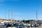 Weymouth, United Kingdom - 17 July 2020: Weymouth marina with many boats docked and shopping centre in the background