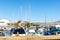 Weymouth, United Kingdom - 17 July 2020: Weymouth marina with many boats docked and shopping centre in the background