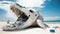 Whale skeleton filled with garbage and plastic pollution on a sandy beach under a blue sky