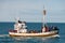 Whale watching boat with passengers going out the Husavik for waching the Humpback Whale.