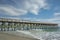 Wharf and wispy clouds