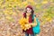 What a beauty. teen girl carry backpack on way to school. child walk in autumn forest or park. fall seasonal weather