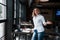 What do you think about this. Businesswoman with curly blonde hair indoors in cafe at daytime