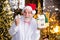 What a great surprise. senior businessman in santa claus hat. illumination is everywhere. playful mood on holiday. toy