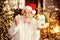 What a great surprise. senior businessman in santa claus hat. illumination is everywhere. playful mood on holiday. toy