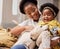 This is what makes life worth it. a young mother and daughter relaxing with their pet at home.