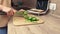 What's cookin. A woman's hands are placed in close-up on slices of bread, cheese, bacon.