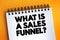 What Is A Sales Funnel text on notepad, concept background