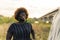 what a wonderful day - Afro-American woman laughing in the nature, medium closeup