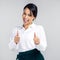 Whatever youre passionate about, thats your purpose. Studio shot of a confident young businesswoman giving a thumbs up