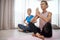 Whats more beautiful than being accepted. two mature women doing exercises together on the floor at home.