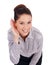 Whats that you said. Studio portrait of a positive-looking young business woman cupping her hand to her ear isolated on