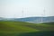 wheat farm hill with wind mill