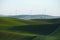 wheat farm hill with wind mill