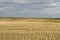 Wheat field and small village in Canadian Prairies