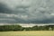 Wheat field and stormy sky