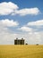 Wheat fields, silo, clouds