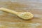 Wheat grains wooden spoon