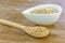 Wheat grains wooden spoon