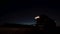 Wheat harvesting with combine harvester at night