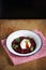 Wheat risotto with beetroot, cilantro and poached egg