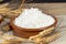 Wheat spikes beside pastry flour