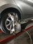 Wheel alignment machine employs diagnostic systems that are used to measure the toe, camber, caster, and ride height to the car