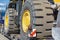 Wheel of a bulldozer close-up on a transport platform. Concept: road construction, heavy construction equipment