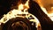 A wheel burns in a car at night, car tires burn, close-up