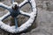 Wheel carriage covered in snow