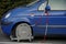 Wheel clamp installed on a wheel of an incorrectly parked car.