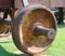 The wheel covered with rust from the car of the old railway