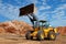 Wheel loader bulldozer in sandpit