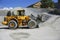 Wheel loader Excavator unloading sand