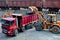 Wheel loader loads gravel into a dump truck at a cargo railway station. Fron-end loader unloads crushed stone in a gravel pit.