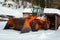 Wheel loader machine with snow chains is ready for the snow removing job