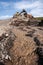 Wheel loader in a mountainous area in an industrial area where minerals are mined.