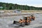 The wheel loader unloads crushed stone in a gravel pit.