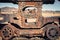 Wheel of an old rusty wagon abandoned in the train cemetery of Uyuni Bolivia