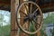 Wheel of the past. An ancient old wooden wheel from a rural cart