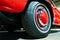 Wheel of red Retro car in the garage in Berlin