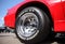 The wheel of a sports car at motor show, Belarus, Minsk, may, 07.2016: nternational festival of retro cars `Retrominsk`.