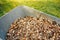 Wheelbarrow full of wooden mulch