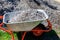 Wheelbarrow with gravel at construction site