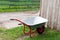 Wheelbarrow on green grass