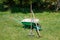 Wheelbarrow with lawn rake and claw cultivator