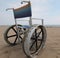 wheelchair with large wheels in perforated aluminum to move on t