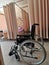 Wheelchair stands in the intensive care unit of the hospital