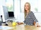 This is where magic happens. a beautiful young woman working at her office desk.