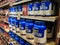 Whey protein jars on store shelf